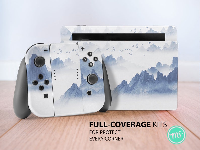May include: A white Nintendo Switch console and Joy-Con controllers with a blue and white mountain landscape design. The text "FULL-COVERAGE KITS FOR PROTECT EVERY CORNER" is printed below the console.
