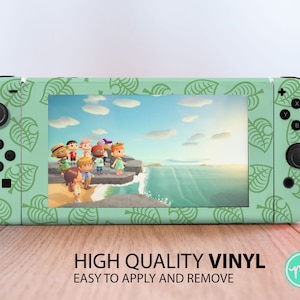 May include: A green Nintendo Switch console skin with a pattern of green leaves. The skin has a screen protector and a cutout for the console's buttons. The skin is designed to look like the leaves from the Animal Crossing video game.