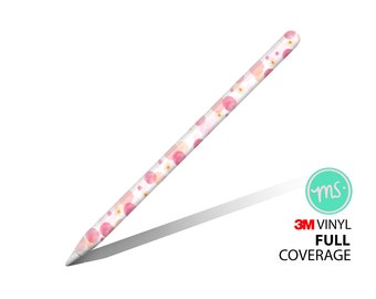 May include: A white Apple Pencil with a pink and white watercolor design featuring circles and flowers. The design is labeled with "3M Vinyl Full Coverage".