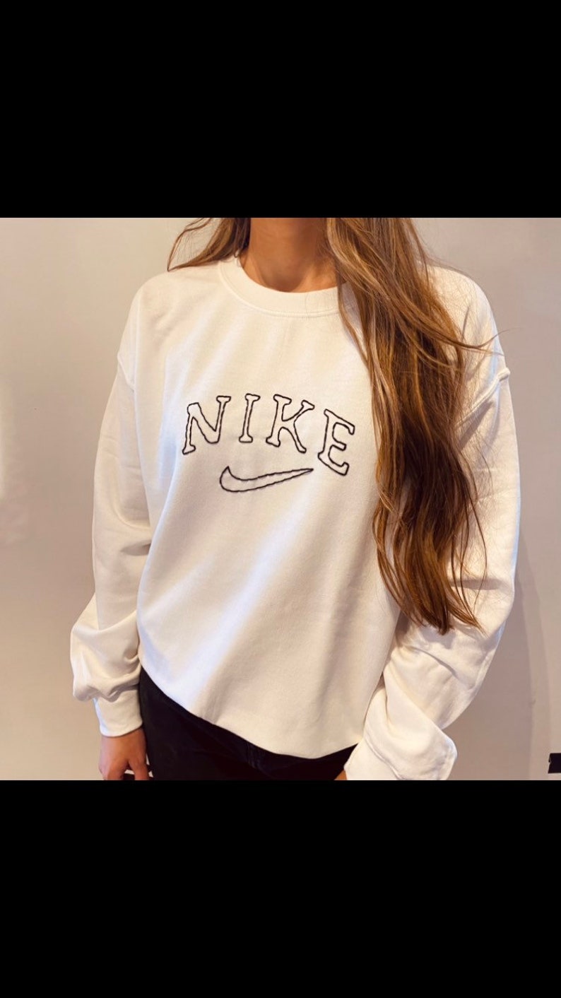 embroidered nike jumper