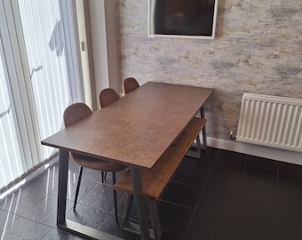 Bronze Concrete Ferro effect modern Dining Table with a choice of legs in Silver or Black