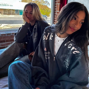 Folklore Zip-Up: Gray Unisex Hoodie with Glitter Ink