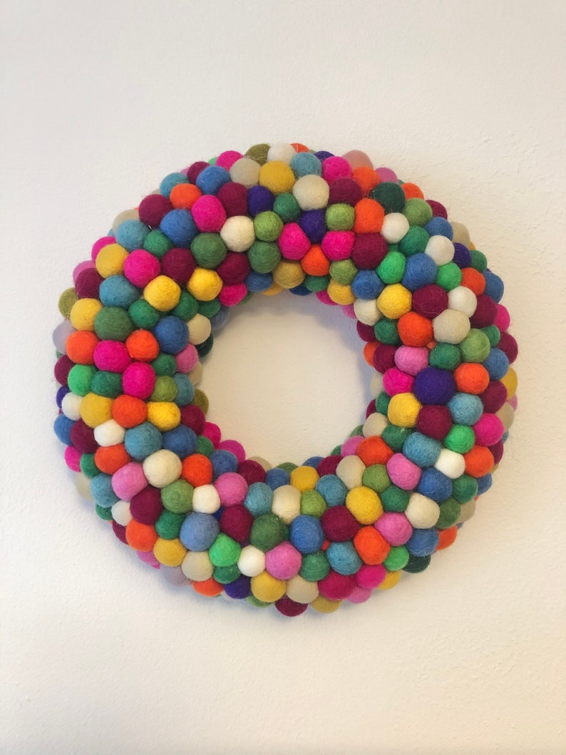 Rainbow felt ball Wreath 35cm available made with felt balls hand made in Nepal. 35 Centimeters