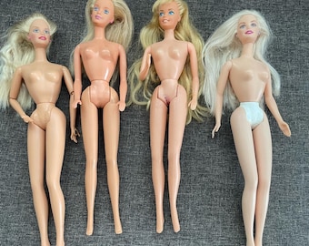 Mattel lot of 4 Barbie dolls