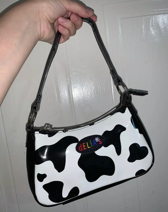 delias cow print purse