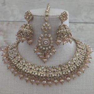 Conjunto de joias indianas asiáticas com decote champanhe em ouro antigo