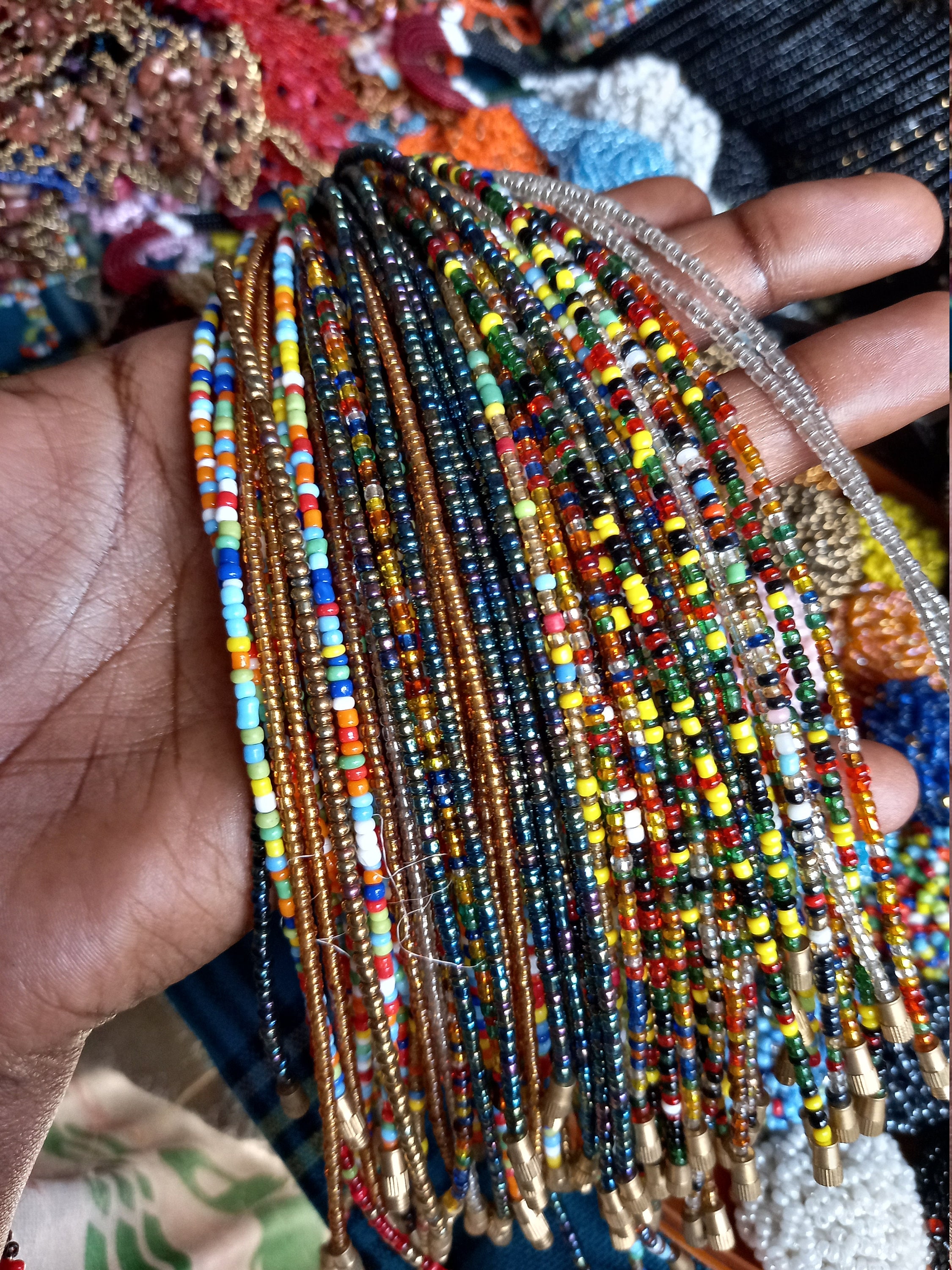 Handmade African Waist beads from West Africa Senegal. Unique beads with a  sparkle to them. Made with Long Lasting Stretchy material for durability.