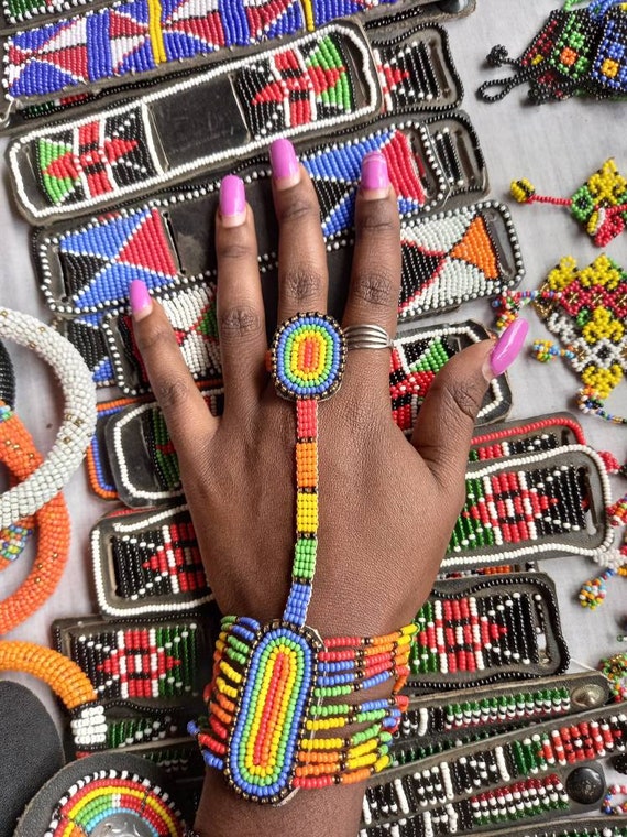 Red and White Beaded Maasai Bracelet by Naruki Crafts | Fair Trade