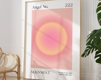 May include: A pink and yellow gradient circle with the text "Angel No. 222" and "ALIGNMENT" in black text. The text "You are in the right place & right time" is also in black text.