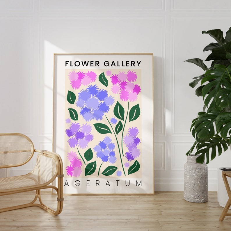 May include: A poster with a floral design featuring purple and pink flowers with green stems. The poster has the text "FLOWER GALLERY" and "AGERATUM" printed on it.