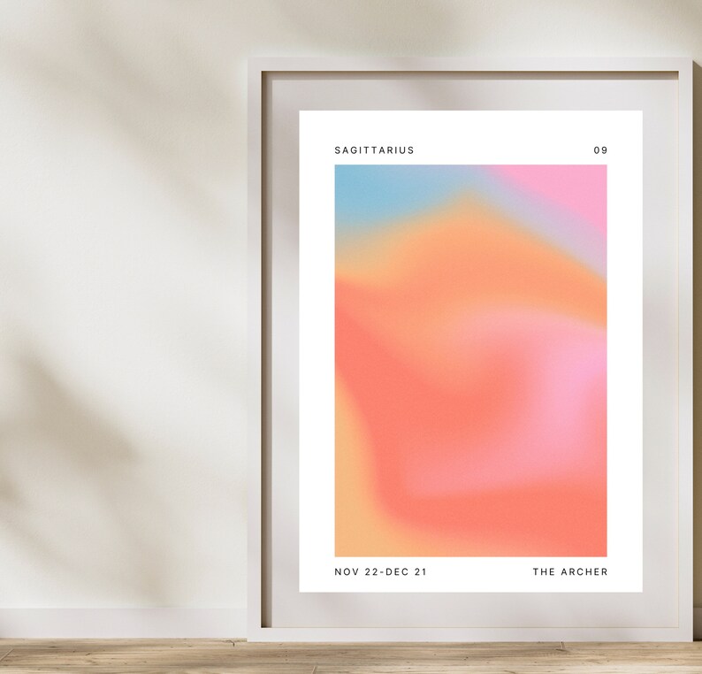 Może przedstawiać: Biały plakat w ramie z kolorowym gradientem tła. Plakat zawiera tekst "SAGITTARIUS" u g&oacute;ry, "NOV 22-DEC 21" w lewym dolnym rogu i "THE ARCHER" w prawym dolnym rogu.