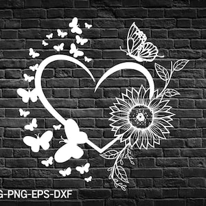 May include: A white silhouette of a heart with a sunflower and butterflies on a black brick background. The heart is formed by a curved line with butterflies on one side and a sunflower on the other.