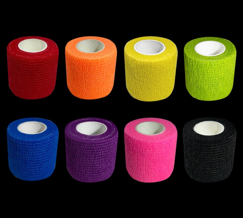 May include: Eight rolls of athletic tape in different colors: red, orange, yellow, green, blue, purple, pink, and black.