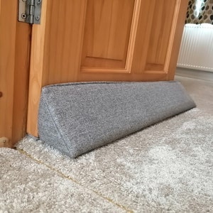 Dragstopp XL Triangular® | Tung, Krokbar | Urval av tyger | Dragstopp UK