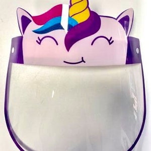May include: Purple and pink unicorn face design on a clear plastic face shield with a purple border.