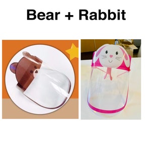 May include: Two clear plastic face shields with cartoon animal designs. One shield has a brown bear design and the other has a pink rabbit design.  The shields are pink and white.