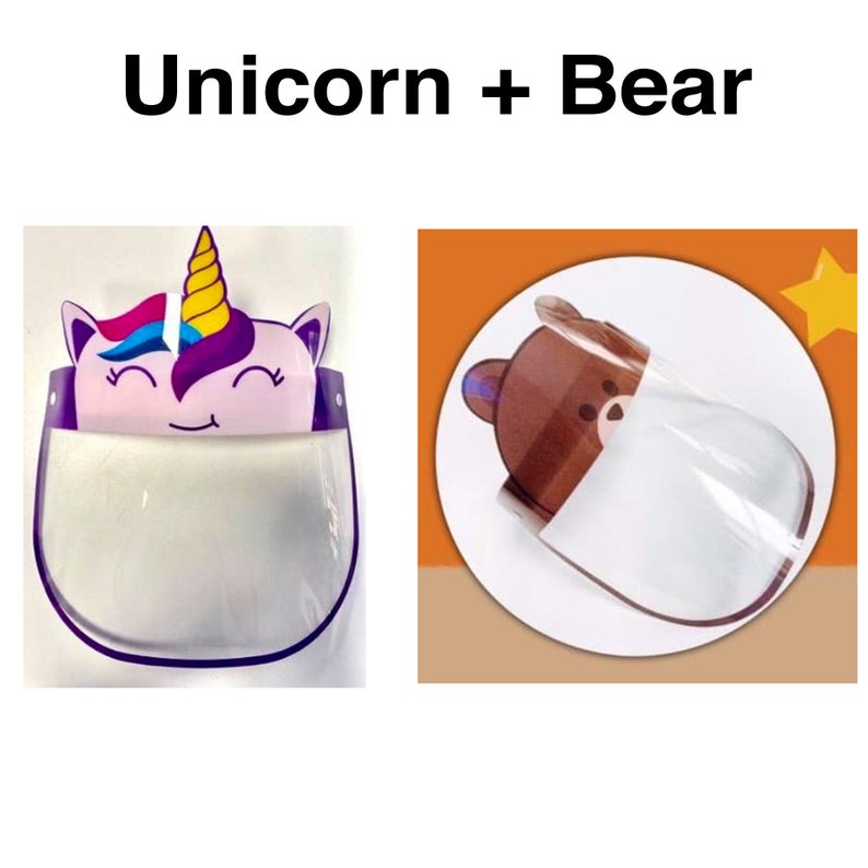 May include: Two clear plastic face shields with colorful cartoon designs. One shield features a purple unicorn with a yellow horn and the other features a brown bear. The text "Unicorn + Bear" is displayed above the shields.