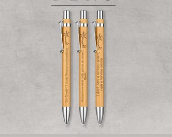 May include: Three light brown wooden pens with silver clips and tips. Each pen features a laser-engraved neuron illustration and text: Me Nerdy? I think Neuron to something, Do you know what really gets on my nerves? Myelin, and I don't have a nervous system, I am a nervous system.