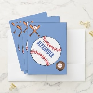 May include: A blue background with a white baseball with red stitching. The baseball has the name "ALEXANDER" written on it. There are two crossed baseball bats and a brown baseball glove with a baseball in it.