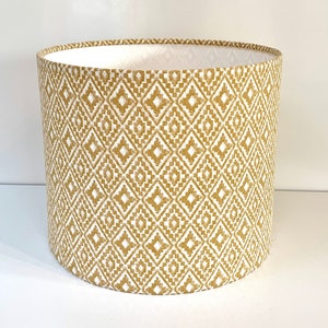 Ikat design lampshade in neutral ochre natural cotton handmade drum ceiling / table lamp.