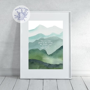 May include: A watercolor painting of green and blue mountains with a quote from J.R.R. Tolkien's The Two Towers: "There's some good in this world, Mr. Frodo, and it's worth fighting for."