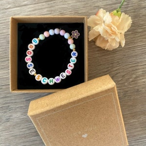 Armband / Schwester / Geschwister / personalisiert / Anhänger/Ostern /Geburtstag /grosse Schwester/ Mit Blume