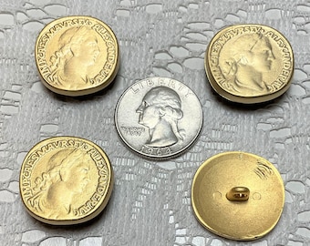 May include: Four gold-colored buttons with a raised design. The buttons feature a profile of a person's face with text around the edge. The text on the buttons reads "IMP CAES MAVRS SEV ALEXANDER AVG". One button is a plain gold-colored button with a hole in the center.