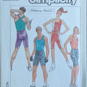 May include: Simplicity sewing pattern number 8562, size MD, for a cycling outfit. The pattern includes instructions for sewing on an overlock/serger or conventional machine. The pattern features three illustrations of people wearing different styles of cycling shorts and tops. The text "Sherry Halt" is printed on the pattern.