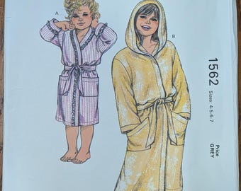 Uncut Vintage Kwik Sew Sewing Pattern 1562 for Girls' Robe with or without Hood.  Sizes 4-7.