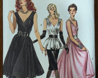 Uncut Vintage Vogue Sewing Pattern #7053 for Misses' Dress, Top and Skirt. Size 8.