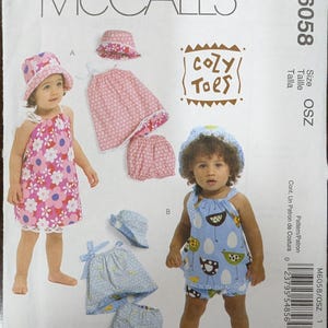Uncut McCall&#39;s Sewing Pattern #M6058 for Infants&#39; Reversible Dresses, Panties and Hat. Sizes S-M-L
