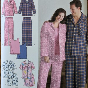 May include: A Simplicity 3971 sewing pattern envelope for pajamas, featuring illustrations of button-down shirts, tank tops, and pants in various patterns. The cover displays two people wearing pink floral and blue plaid pajama sets.
