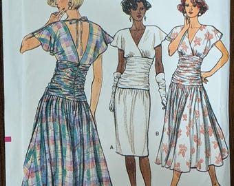 Uncut Vintage Vogue Sewing Pattern #9550 for Misses' Dress with 3 Variations. Sizes 6-10.