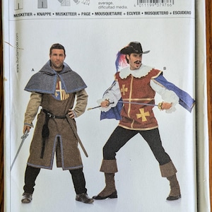 May include: A Burda 7976 sewing pattern envelope featuring two historical costume designs. Design A shows a brown hooded tunic with a blue trim and crest. Design B displays a red doublet with gold crosses, a white ruff, and a blue cape.