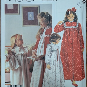 May include: A McCall's 2190 sewing pattern envelope for small petite sizes. The front features illustrations of three nightgowns with ruffles, long sleeves, and button closures, shown on children. One gown is solid white, others have red polka dots.