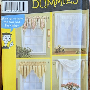 May include: A Simplicity sewing pattern envelope for window treatments titled For Dummies. The packaging features four distinct curtain designs labeled A, B, C, and D, showcasing floral and solid white fabric styles for home window decor.
