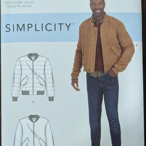 May include: Simplicity sewing pattern S9190 featuring a bomber jacket design. The pattern includes size options from 44 to 52 inches. The image shows a man wearing a brown suede bomber jacket, blue jeans, and brown sneakers.