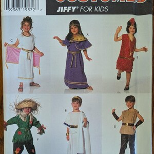 Uncut Simplicity Costumes Sewing Pattern #7386 for Child's Costumes. Scarecrow, Egyptian Queen, Flapper and More. Sizes S-L.