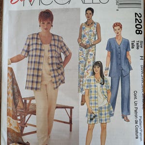 May include: Easy McCall's 2208 sewing pattern envelope featuring illustrations of clothing sets including a plaid jacket, solid top, and pants or shorts. The text includes Easy McCall's, 2208, Womanstyle, and Petite-Able. The designs show various outfits.