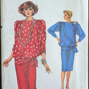 May include: Vintage sewing pattern featuring two women's outfits. One woman is wearing a red outfit with a white pattern, and the other is in a blue dress. The pattern is labeled "Very Easy Very Vogue" and includes size information.