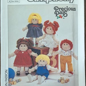 May include: A set of three ceramic mugs with a speckled, matte finish. The mugs are in shades of cream, light gray, and dark gray. Each mug has a simple, minimalist design, perfect for coffee or tea.