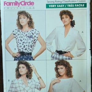 May include: Butterick sewing pattern 6085 featuring four different blouse designs. The pattern includes the text "VERY EASY / TRÈS FACILE" and the size range (6-8-10). The Family Circle Collection logo is also visible.