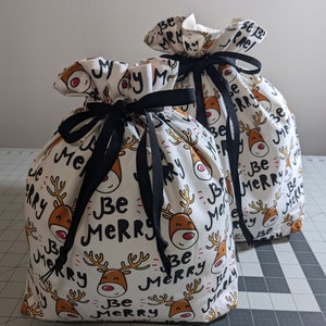 Be Merry Reindeer Christmas Holiday Fabric Drawstring Gift Bags Reusable Washable Eco-Friendly Waste Free