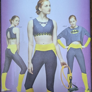 Uncut Simplicity Sewing Pattern #8633 for Misses and Misses&#39; Plus Size Knit Sports Bra and Knit Top and Leggings. Sizes XS-XL.
