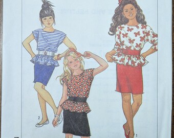 Uncut Simplicity Sewing Pattern #9599 for Girls' Pullover Dress. Sized for Stretch Knits Only. Sizes S-L (7-14).