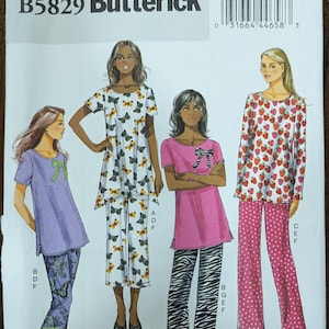May include: A sewing pattern for three different tops and pants. The pattern is for sizes large, extra large, and extra extra large. The pattern is from Butterick and the pattern number is B5829. The tops are all different colors and have different patterns. The pants are all different colors and have different patterns.