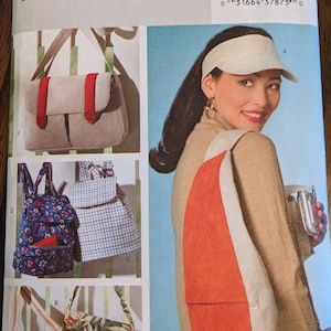 May include: Butterick B4147 sewing pattern featuring various bag designs. Includes a shoulder bag with red accents, floral and striped tote bags, and backpacks in floral and plaid patterns. The pattern also shows a woman wearing a visor and a shoulder bag.