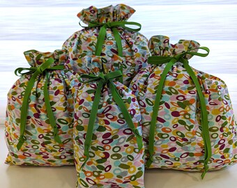 Eco-Friendly Oval Explosion Fully Lined Drawstring Fabric Gift Bags. 4 Sizes Available. Washable, Reusable, 100% Cotton.