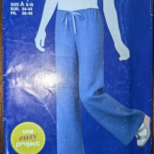 Uncut Simplicity Sewing Pattern #E2012 for Misses and Misses&#39; Plus Size Pull-On Pants. Sizes 8-18.
