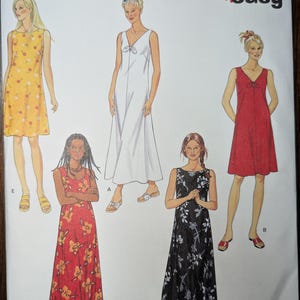 May include: A sewing pattern for four sleeveless dresses. The pattern includes a white dress with a tie at the neckline, a red dress with a tie at the neckline, a yellow floral dress, and a black and white floral dress. The pattern is labeled "New Look" and "Easy".